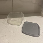 Set of small plastic food storage containers