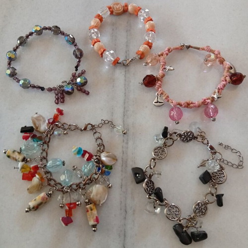 Bracelets used, colorful with cords and beads