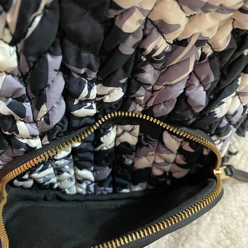 Carpisa backpack like new, white and black