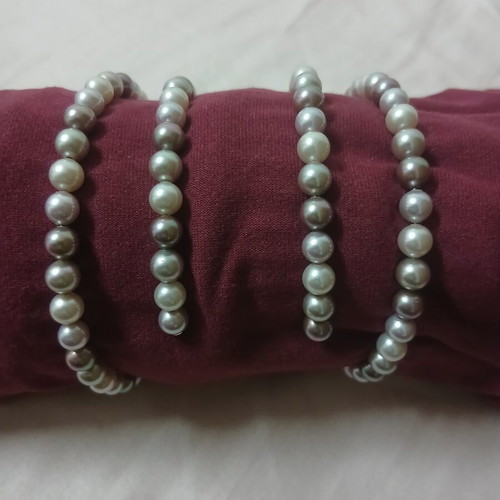 Bracelets set like new, 2 pieces, white and purple