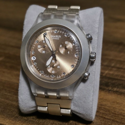 Swatch women's watch like new, gold and transparent color