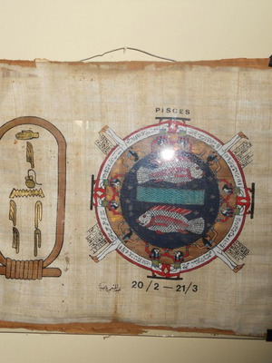 Egyptian papyrus with Pisces zodiac symbol, like new