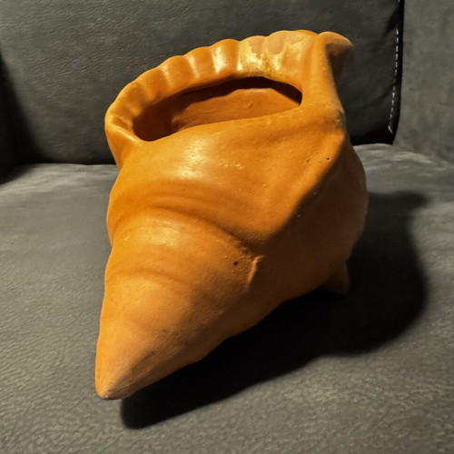 Clay flowerpot in shell shape like new