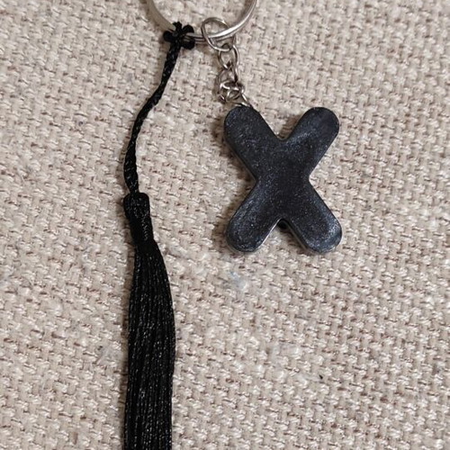 Handmade keychain with resin letter X and tassel