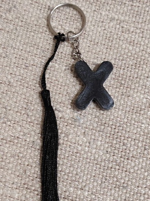 Handmade keychain with resin letter X and tassel