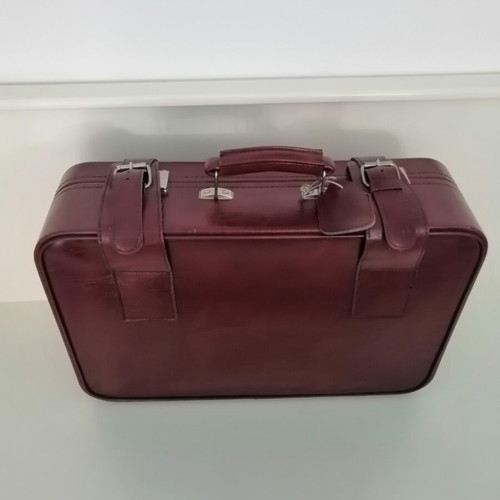Vintage suitcase used, burgundy color, 1970s with metal clasps