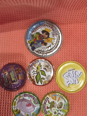 Pokémon Advanced & Megaman collectible metal caps set of 6, like new
