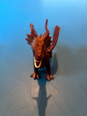 Plastic dragon like new brownish red