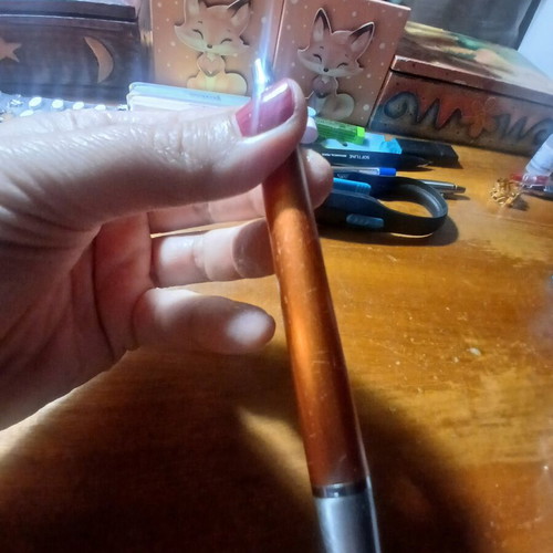 Parker pen like new, orange bronze color