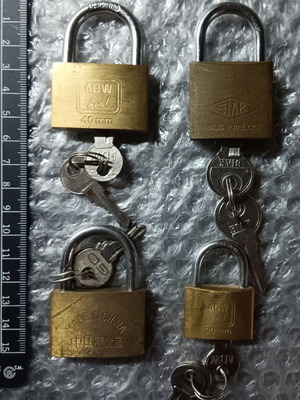 Set of 4 small metal padlocks used