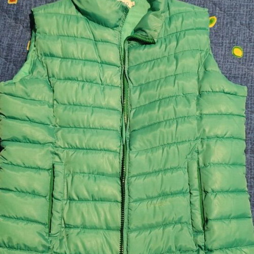 Women's sleeveless turquoise jacket like new