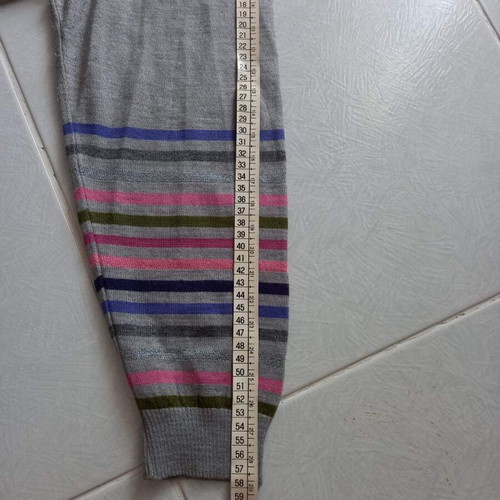 Women's knitted striped sweater like new, gray base with colorful stripes