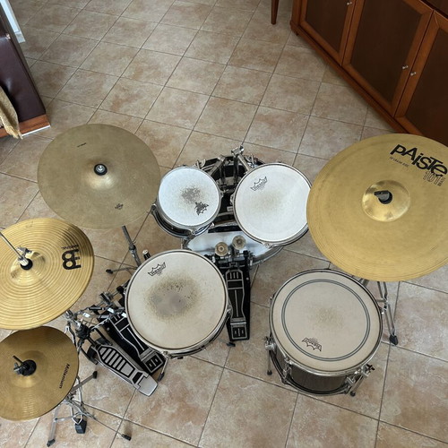 Millenium drum set used with Remo Emperor Coated heads and cymbals