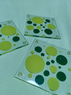 Glass coasters like new with green designs, set of 3
