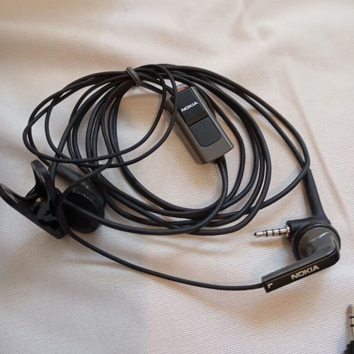 Nokia E66 retro slider phone used with original accessories