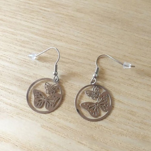 Butterfly earrings new with metal detail and steel hook