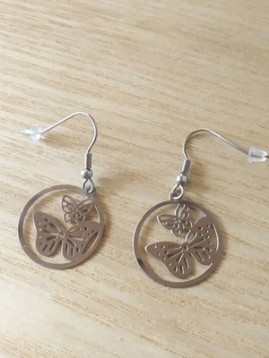 Butterfly earrings new with metal detail and steel hook