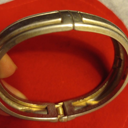 Vintage hinged bangle bracelet like new, gold and silver tone