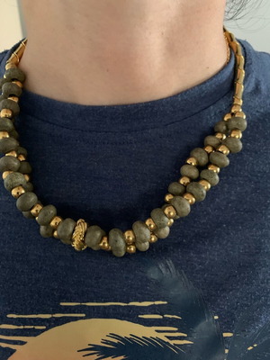 Necklace with khaki stone and gold used