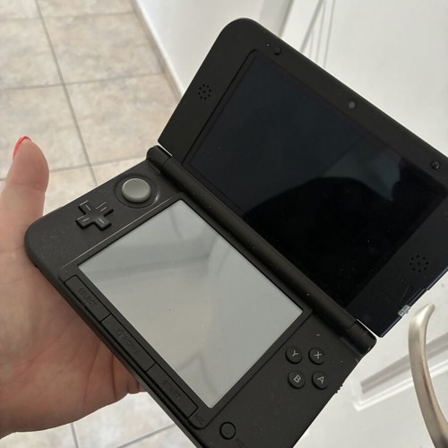 Nintendo 3DS XL Super Smash Bros. Limited Edition used console with 5 games
