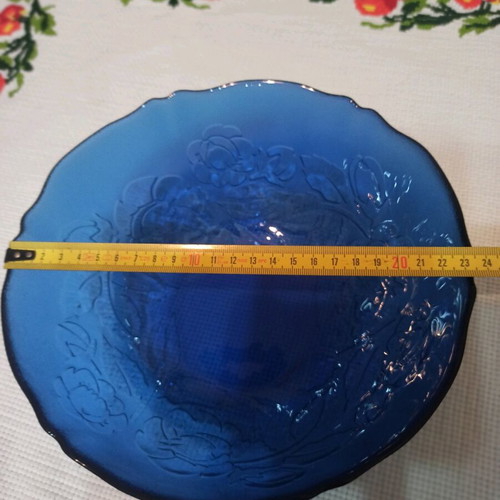 Blue glass salad bowl like new with embossed flowers