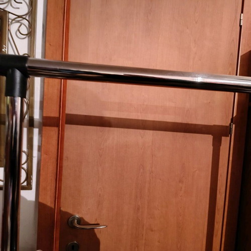 Rolling hanging rack made of metal and plastic like new