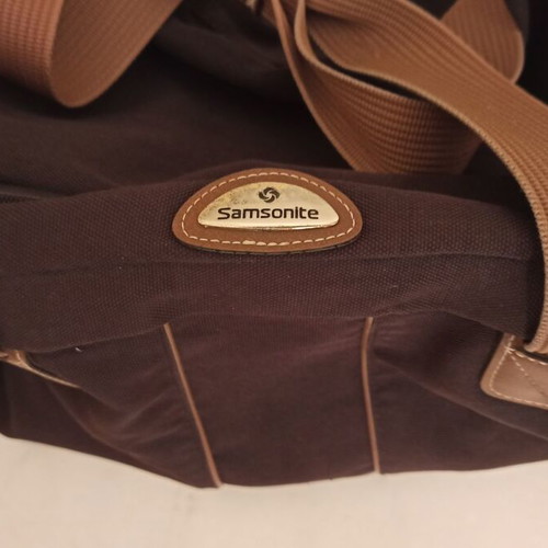Samsonite large travel bag used, needs repair, brown