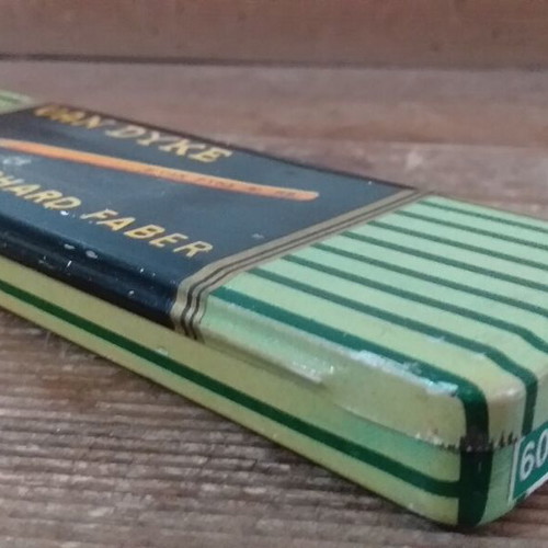 Faber collectible pencils and tin box like new