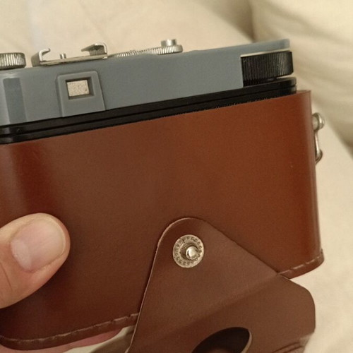 Cosmic 35 camera used, non-functional with leather case