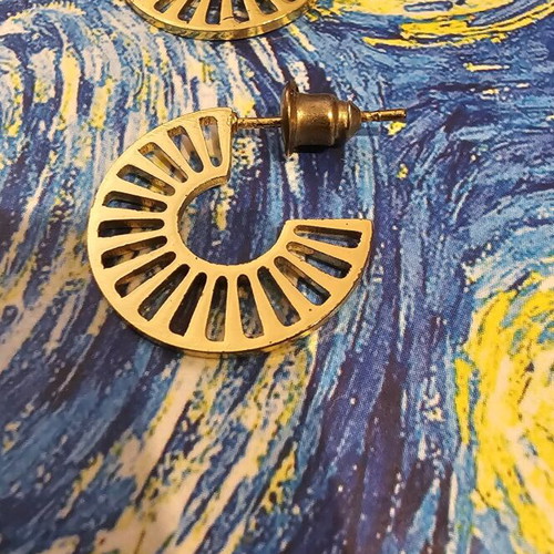 Modern earrings like new