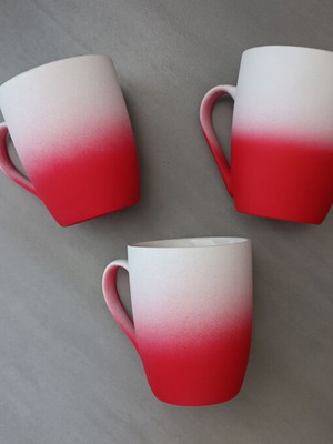 Three two-tone cups, brand new