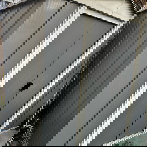 Metal storage shed ideal for outdoor space, spacious