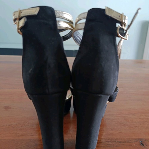 Stefania black high-heeled sandals like new with gold details