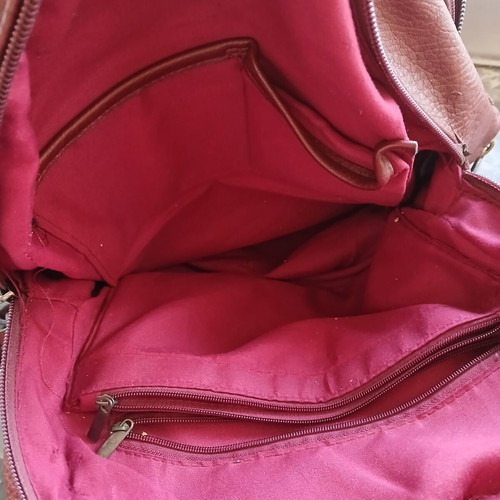 Women's burgundy backpack bag used