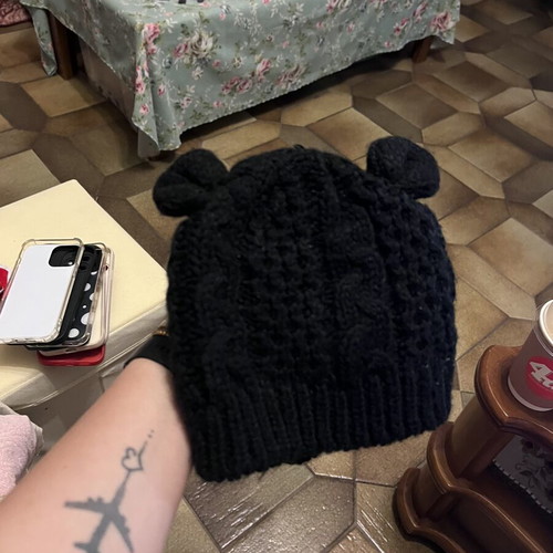 Knitted black hat with ears like new, one size