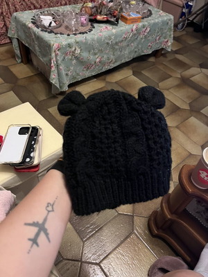 Knitted black hat with ears like new, one size