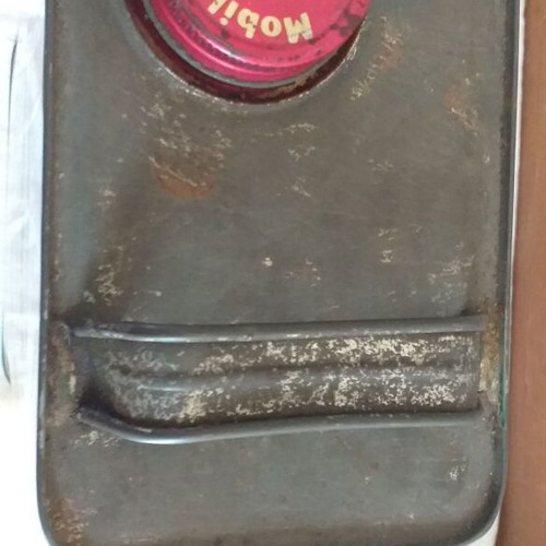 Old metal containers set with Mobil, ZAAE and Petrolatum Liquid