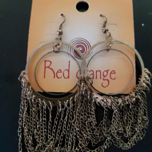 Earrings new, gold color with delicate chain details