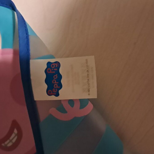 Peppa Pig waterproof bib with sleeves like new