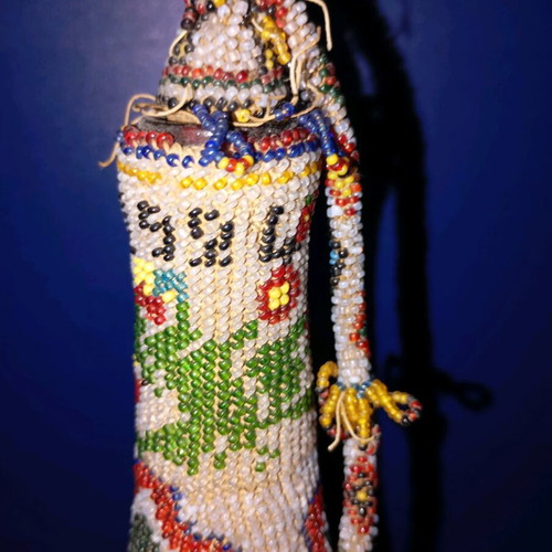 Bottle used with beads and 1924 decoration