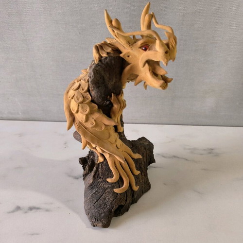 Wooden handmade dragon used with wooden base