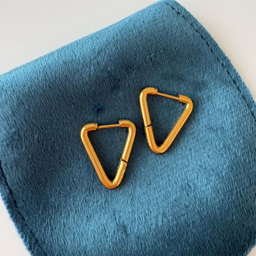Triangle dangle earrings used, gold color