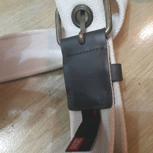 Diesel canvas belt used, white with brass studs and leather details
