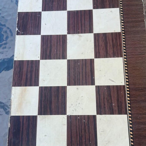 Wooden backgammon used with visible wear
