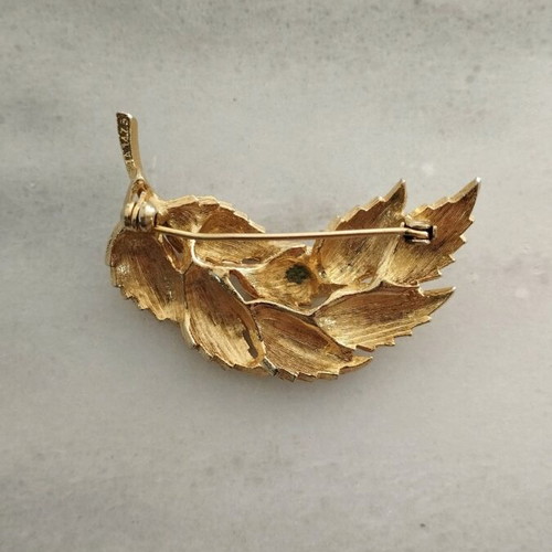 Pin used, old, gold-colored
