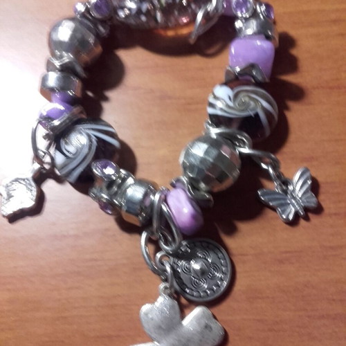 Bracelet with purple stones and silver designs like new