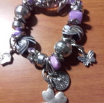 Bracelet with purple stones and silver designs like new