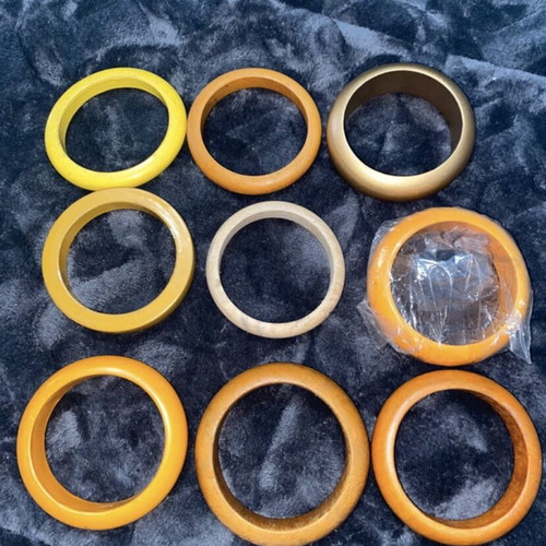 Bracelets new, wooden, plastic and iron multicolor