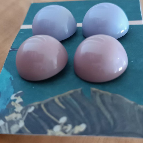 Plastic stud earrings set in lilac and dusty apple colors like new