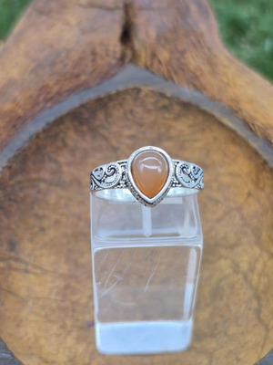 Carnelian gemstone ring with silver plated adjustable band